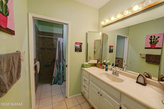 bathroom featuring tile patterned floors, curtained shower, and vanity