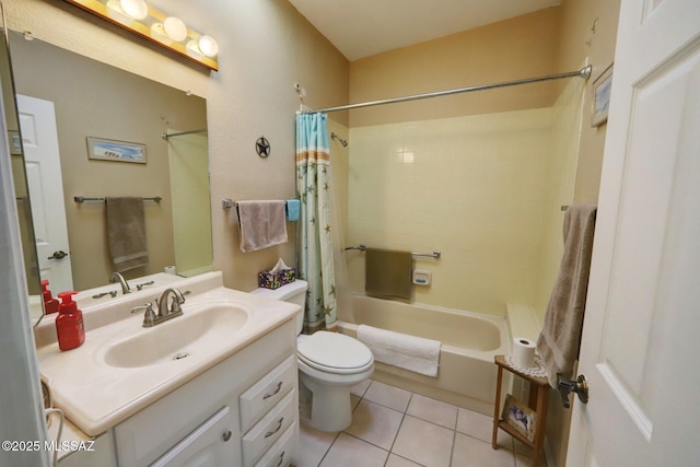 full bathroom featuring shower / tub combo with curtain, tile patterned floors, toilet, and vanity