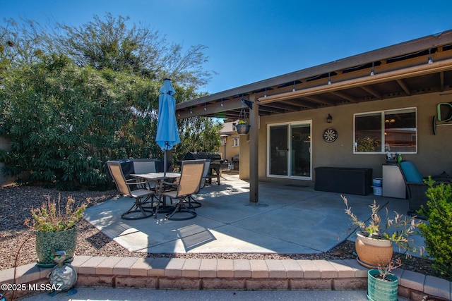 view of patio with outdoor dining space