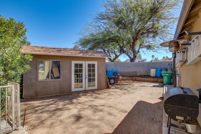 view of patio / terrace with a fenced backyard and french doors