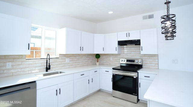 kitchen with white cabinetry, stainless steel electric range oven, and white dishwasher