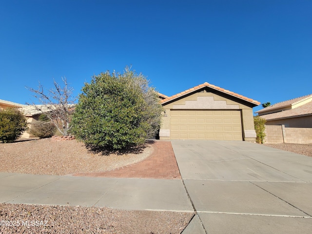 view of front of home featuring a garage