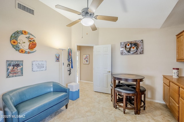 36425 S Golf Course Dr, Tucson, AZ 85739 - sitting room with visible vents, baseboards, ceiling fan, and vaulted ceiling