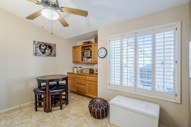 36425 S Golf Course Dr, Tucson, AZ 85739 - dining area featuring plenty of natural light, baseboards, light tile patterned floors, and ceiling fan