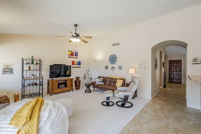 36425 S Golf Course Dr, Tucson, AZ 85739 - living area with a ceiling fan, visible vents, arched walkways, and baseboards