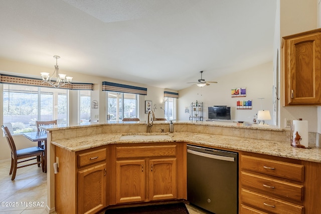 36425 S Golf Course Dr, Tucson, AZ 85739 - kitchen featuring vaulted ceiling, light stone counters, a peninsula, stainless steel dishwasher, and a sink