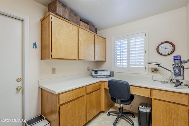 36425 S Golf Course Dr, Tucson, AZ 85739 - office with light tile patterned floors and built in desk
