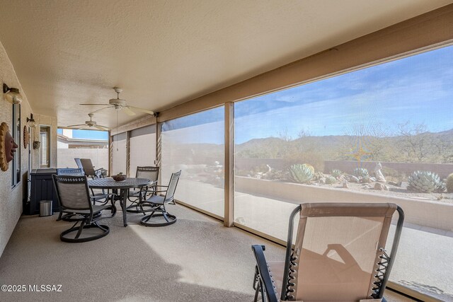 36425 S Golf Course Dr, Tucson, AZ 85739 - sunroom / solarium featuring a ceiling fan