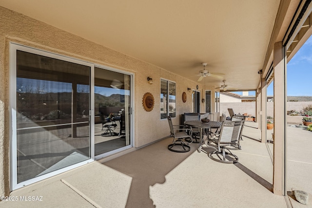36425 S Golf Course Dr, Tucson, AZ 85739 - view of patio featuring outdoor dining space and ceiling fan