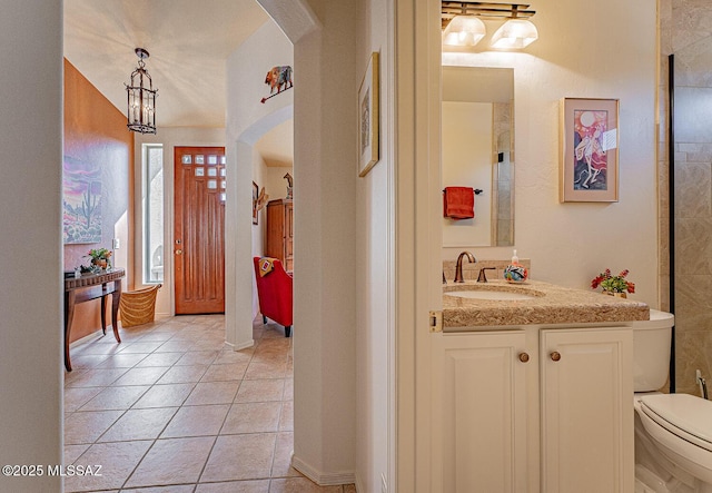 interior space with sink and light tile patterned floors