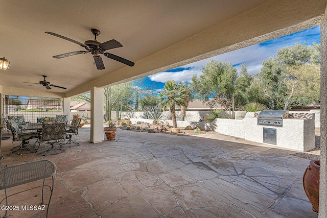 view of patio / terrace featuring a grill, area for grilling, and ceiling fan