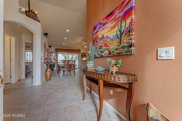 hall featuring tile patterned flooring