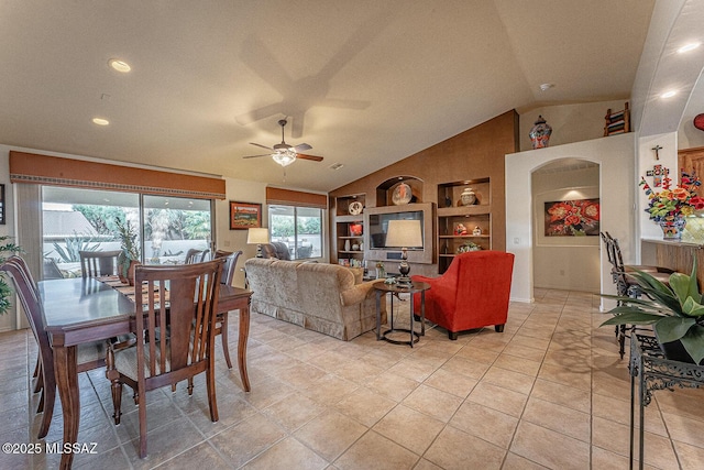 living room featuring lofted ceiling, light tile patterned floors, built in features, and ceiling fan