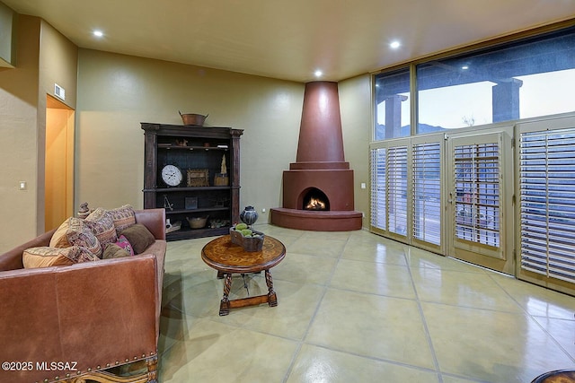 tiled living area with recessed lighting