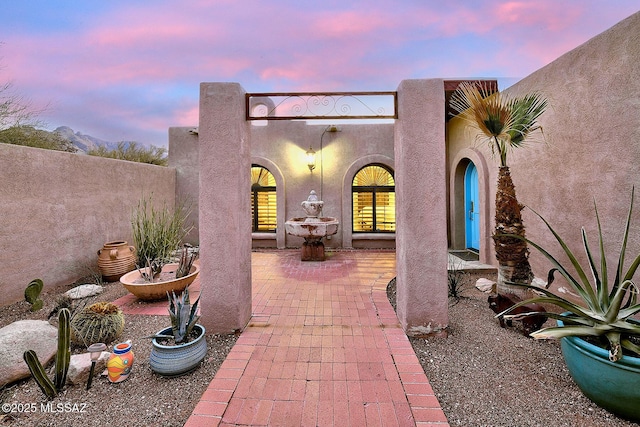 patio terrace at dusk with fence