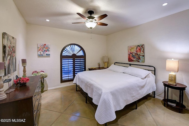 bedroom featuring concrete flooring, recessed lighting, a ceiling fan, and baseboards