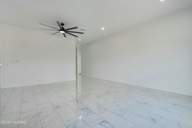 empty room featuring ceiling fan