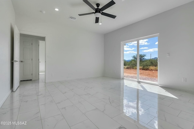 unfurnished room with ceiling fan