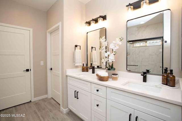 bathroom with vanity and an enclosed shower