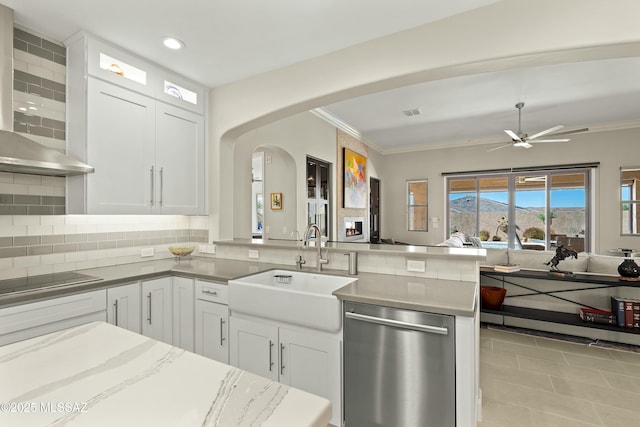 kitchen with white cabinetry, sink, backsplash, stainless steel dishwasher, and black electric stovetop