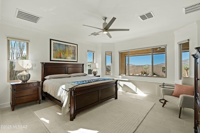 bedroom with ornamental molding, light tile patterned floors, and ceiling fan