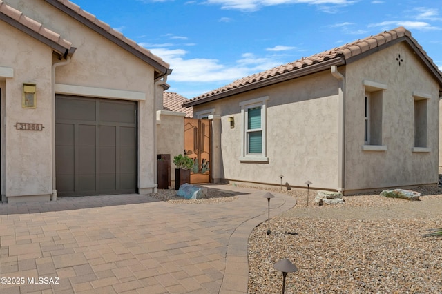 view of home's exterior with a garage