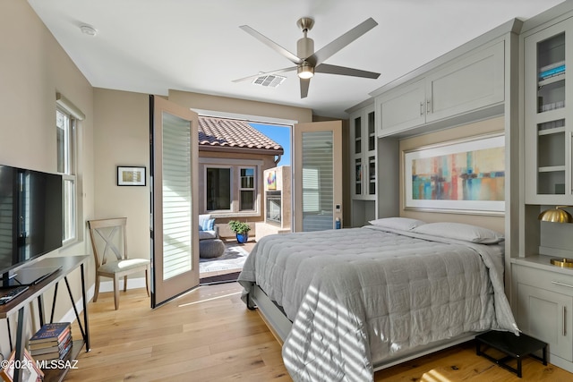 bedroom featuring ceiling fan and light wood-type flooring