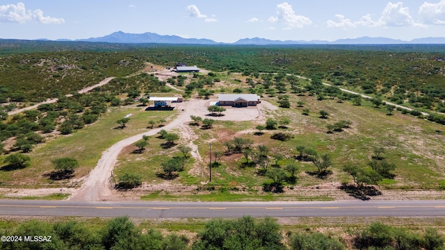 drone / aerial view featuring a mountain view