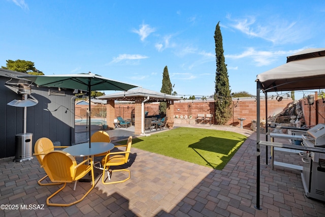 view of patio featuring a gazebo