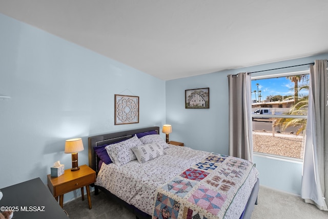 bedroom with light carpet