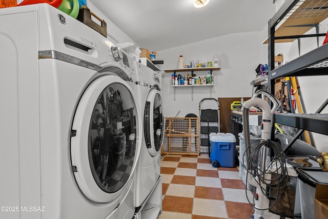 laundry area with independent washer and dryer