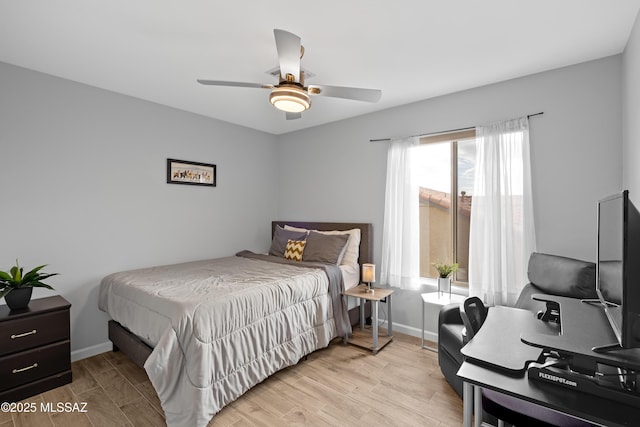 bedroom featuring ceiling fan and light wood-type flooring