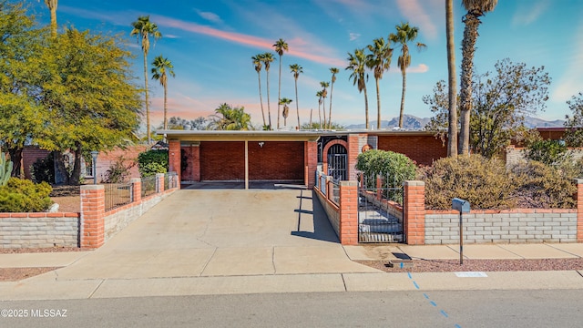 single story home with a carport