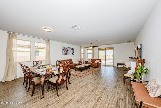 dining area featuring ceiling fan and light hardwood / wood-style floors