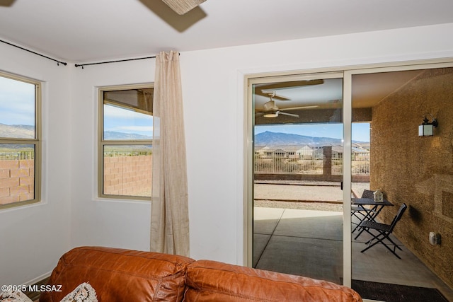 bedroom featuring a mountain view