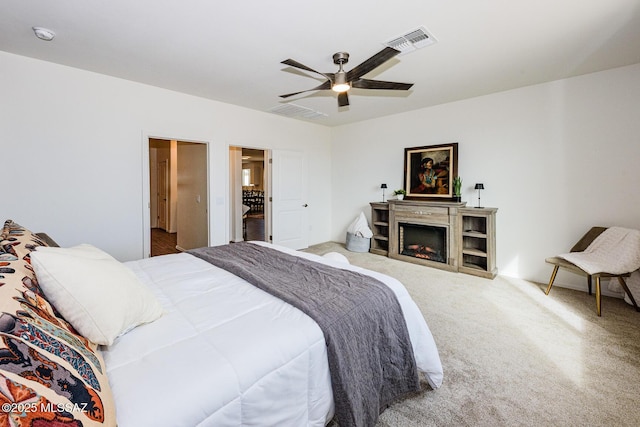 bedroom with carpet flooring and ceiling fan