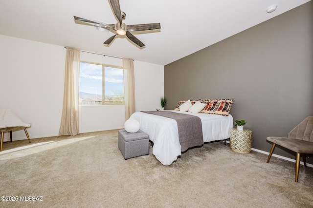 bedroom with ceiling fan and light colored carpet