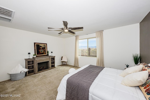 bedroom featuring carpet and ceiling fan