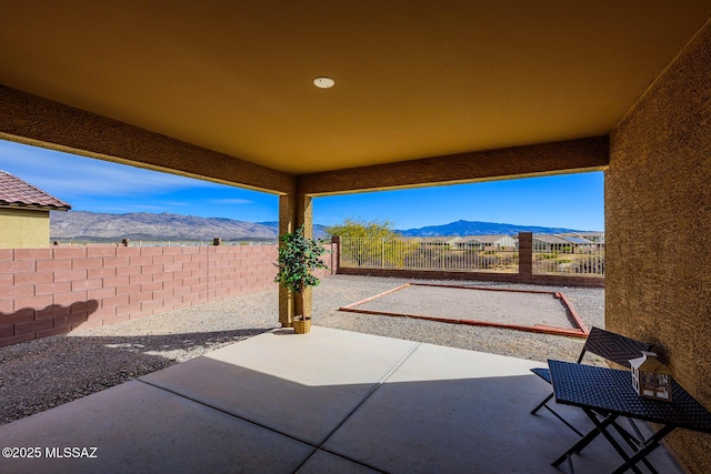 view of patio featuring a mountain view