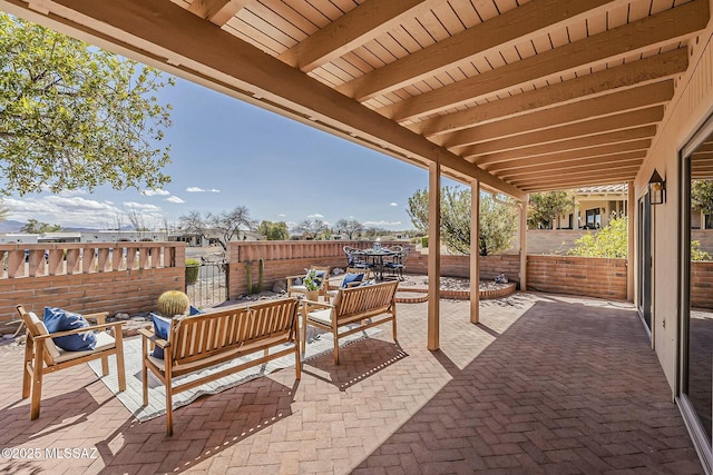 view of patio / terrace with outdoor lounge area, outdoor dining area, and fence