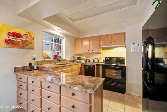 kitchen featuring light stone counters, sink, black appliances, and kitchen peninsula