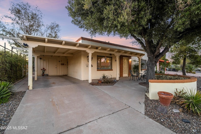 view of front of house featuring a carport