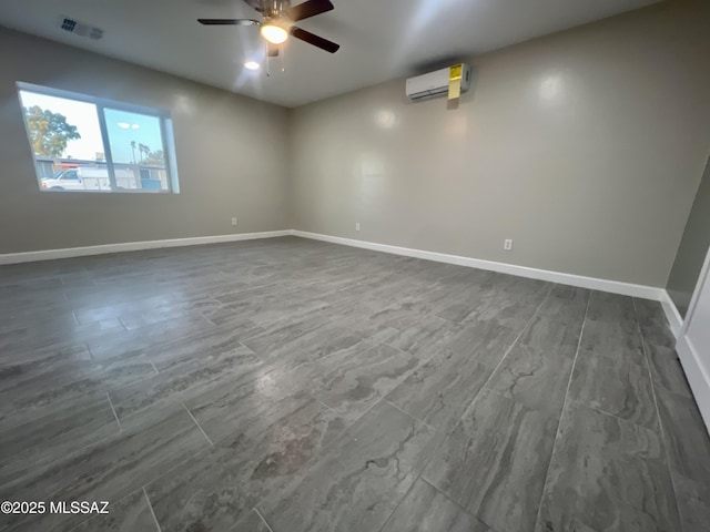 empty room with a wall mounted AC and ceiling fan