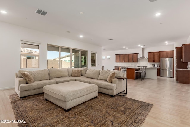 living room with light wood-type flooring