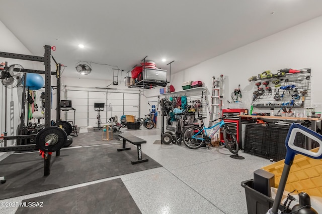 garage with a workshop area