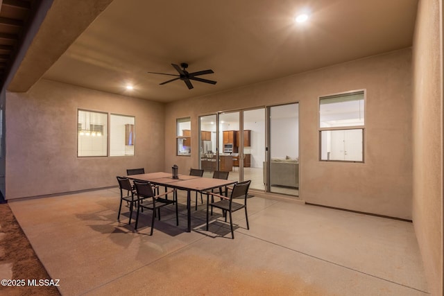 dining space featuring ceiling fan