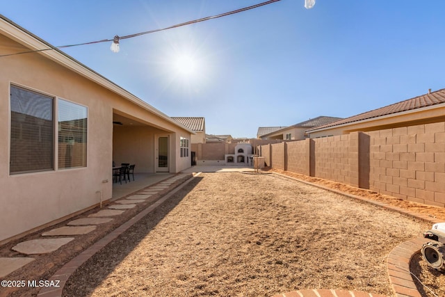 view of yard with a patio area