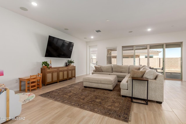 living room featuring light hardwood / wood-style floors