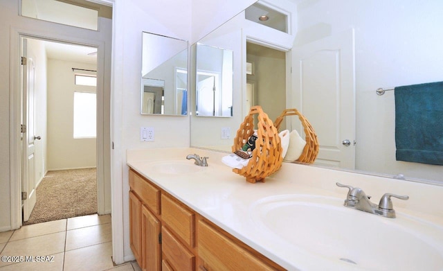 bathroom with tile patterned floors and vanity