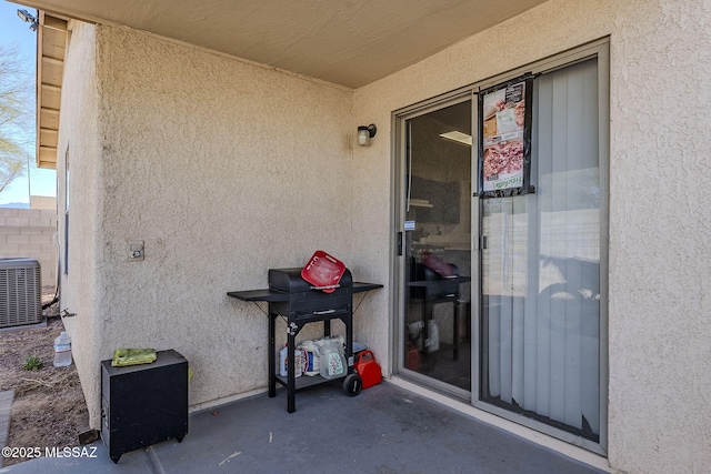 view of patio featuring central AC unit